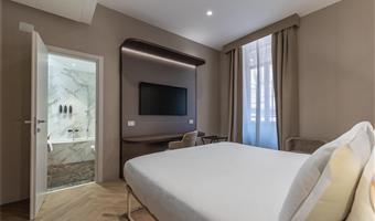 1 letto king, 1 letto singolo, camera deluxe, due bagni