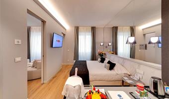 suite -1 letto king size, camere non fumatori, idromassaggio jacuzzi, soggiorno, divano, bagno turco, bollitore per tè