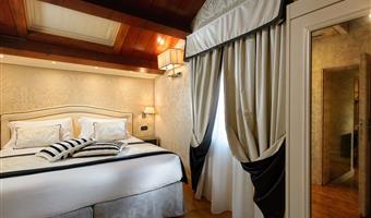 1 letto queen size,  camera premium non fumatori, salottino con divano