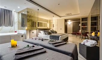 suite spa, 1 letto king size, soggiorno, balcone, vista panoramica