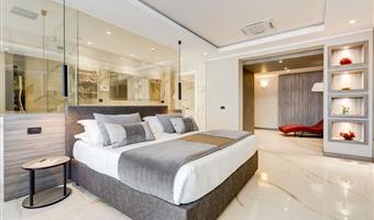 suite spa, 1 letto king size, soggiorno, balcone, vista panoramica
